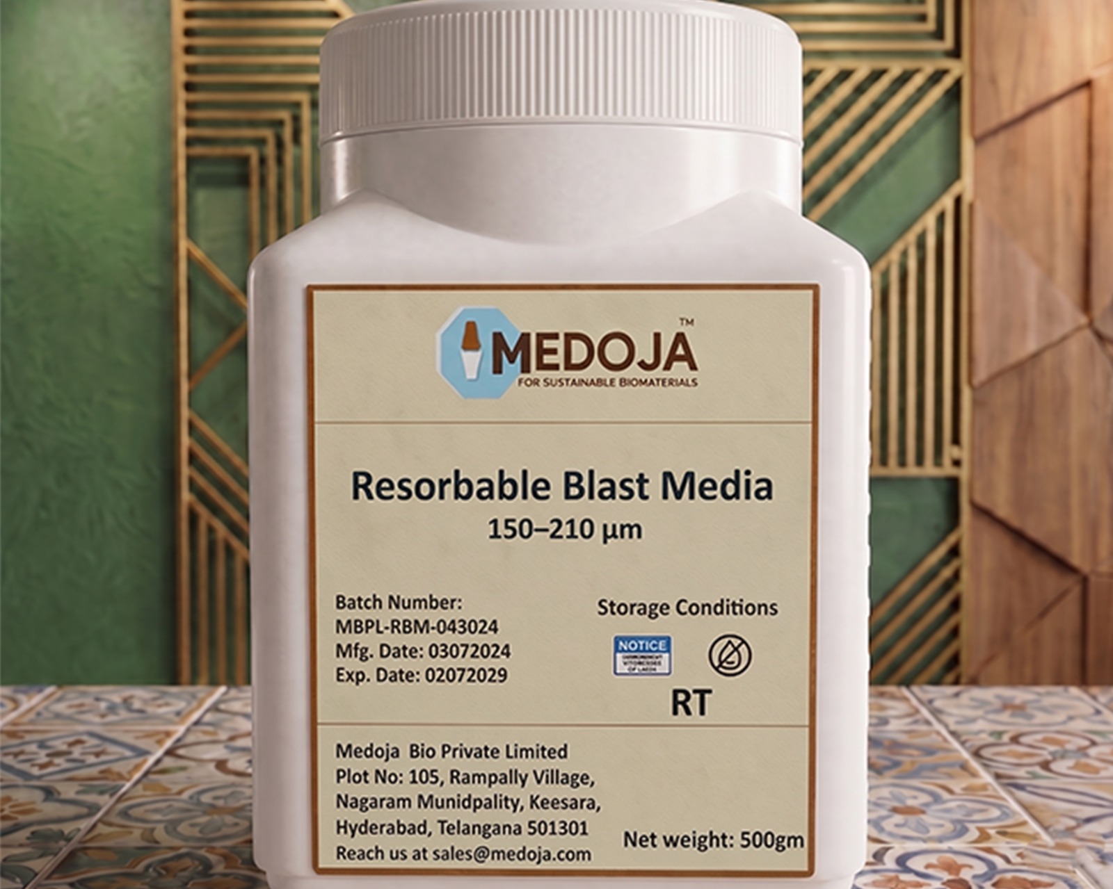 Resorbable blast media hydroxyapatite for dental implant surface treatment